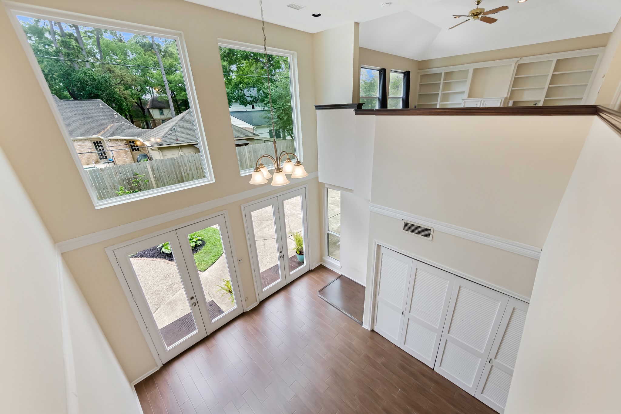 5115 Westerham Place Houston, TX 77069 - Photo 14 of 50 a view of an entryway with wooden floor