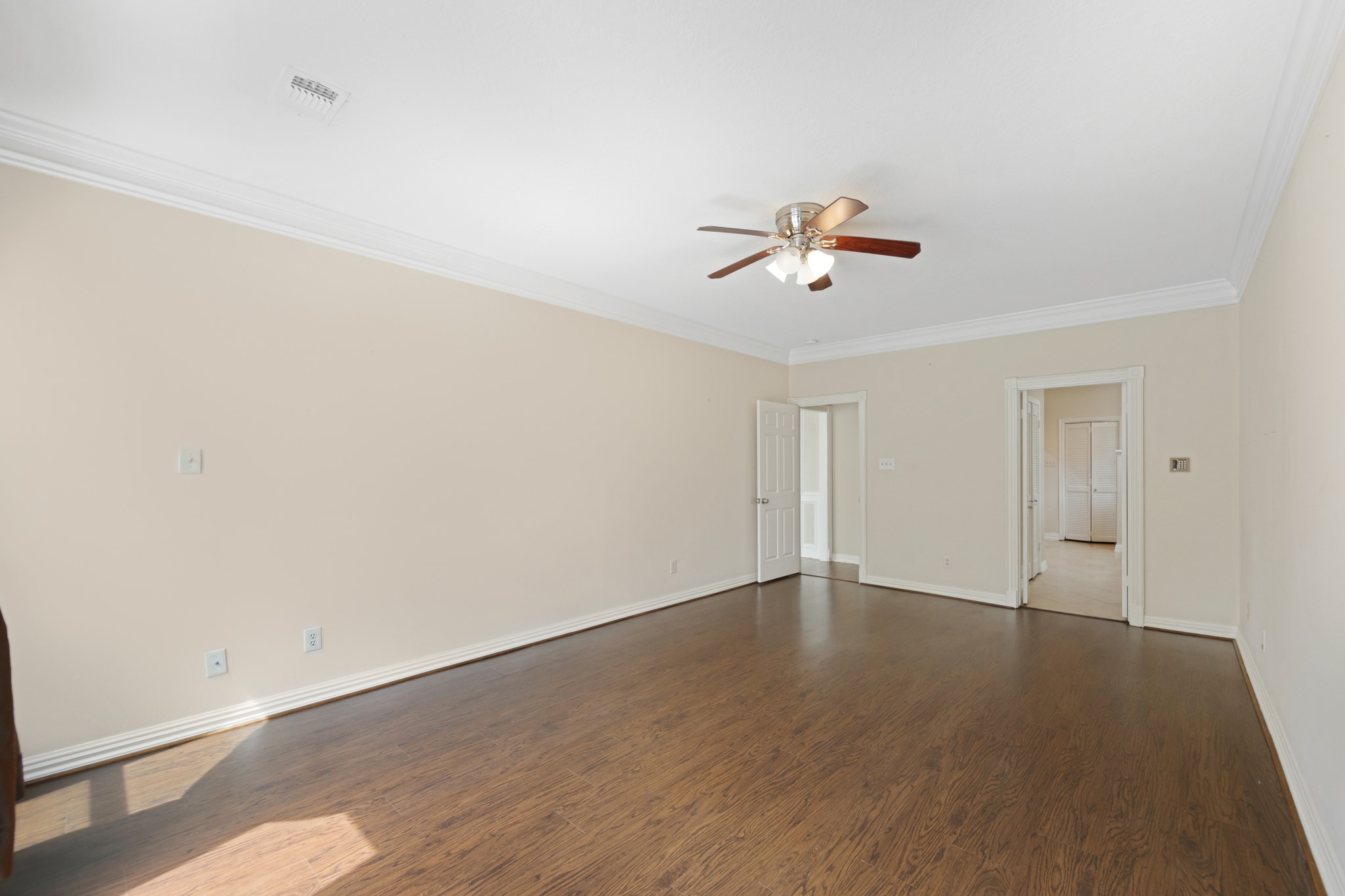 5115 Westerham Place Houston, TX 77069 - Photo 29 of 50 wooden floor in an empty room with a window