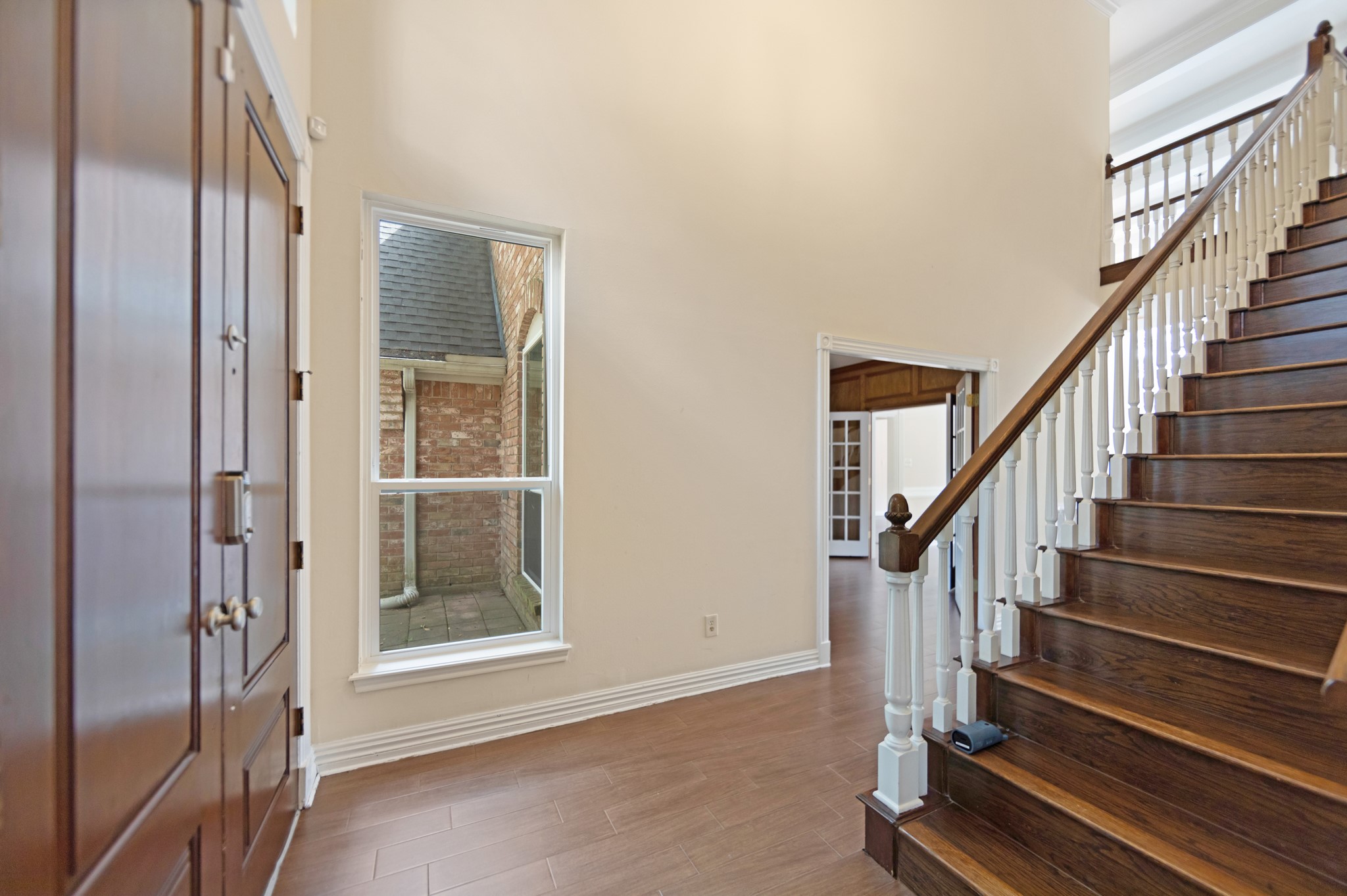 5115 Westerham Place Houston, TX 77069 - Photo 6 of 50 a view of an entryway with staircase