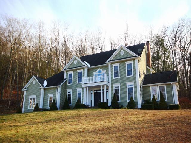 8 Appleby Farm Road Brookfield, CT 06804 - Photo 1 of 1 a front view of a house with a garden