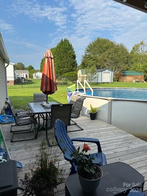1109 Peppertree Drive Stanley, NC 28164 - Photo 3 of 9 a view of a patio with chairs and a potted plant