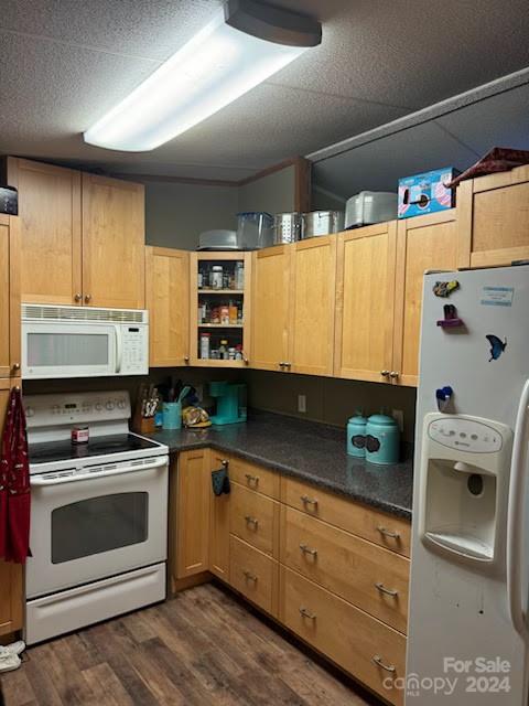 1109 Peppertree Drive Stanley, NC 28164 - Photo 6 of 9 a kitchen with stainless steel appliances granite countertop a stove a sink and a microwave