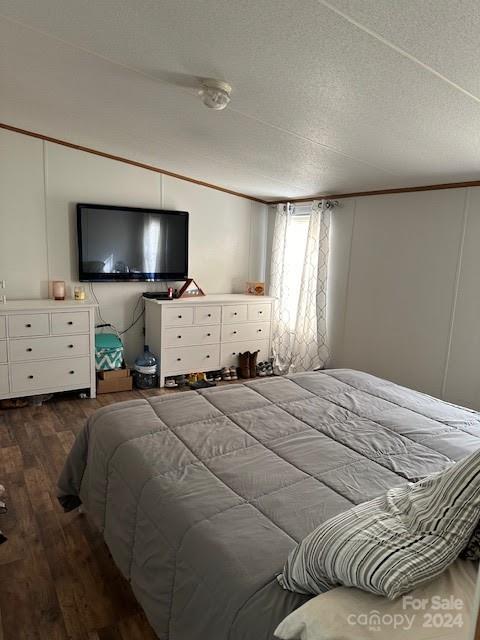 1109 Peppertree Drive Stanley, NC 28164 - Photo 9 of 9 a bedroom with a bed and a flat screen tv