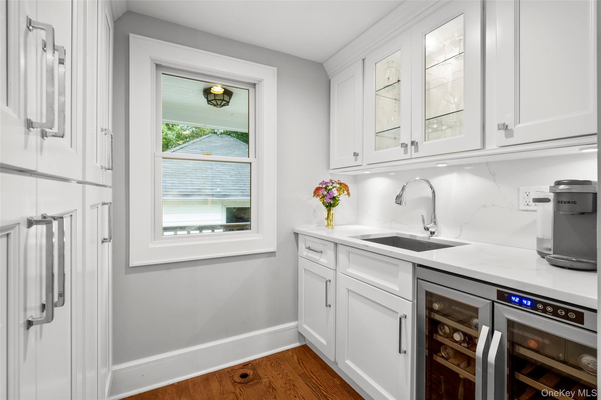 20 Elk Avenue New Rochelle, NY 10804 - Photo 17 of 40 a kitchen with appliances cabinets and a window