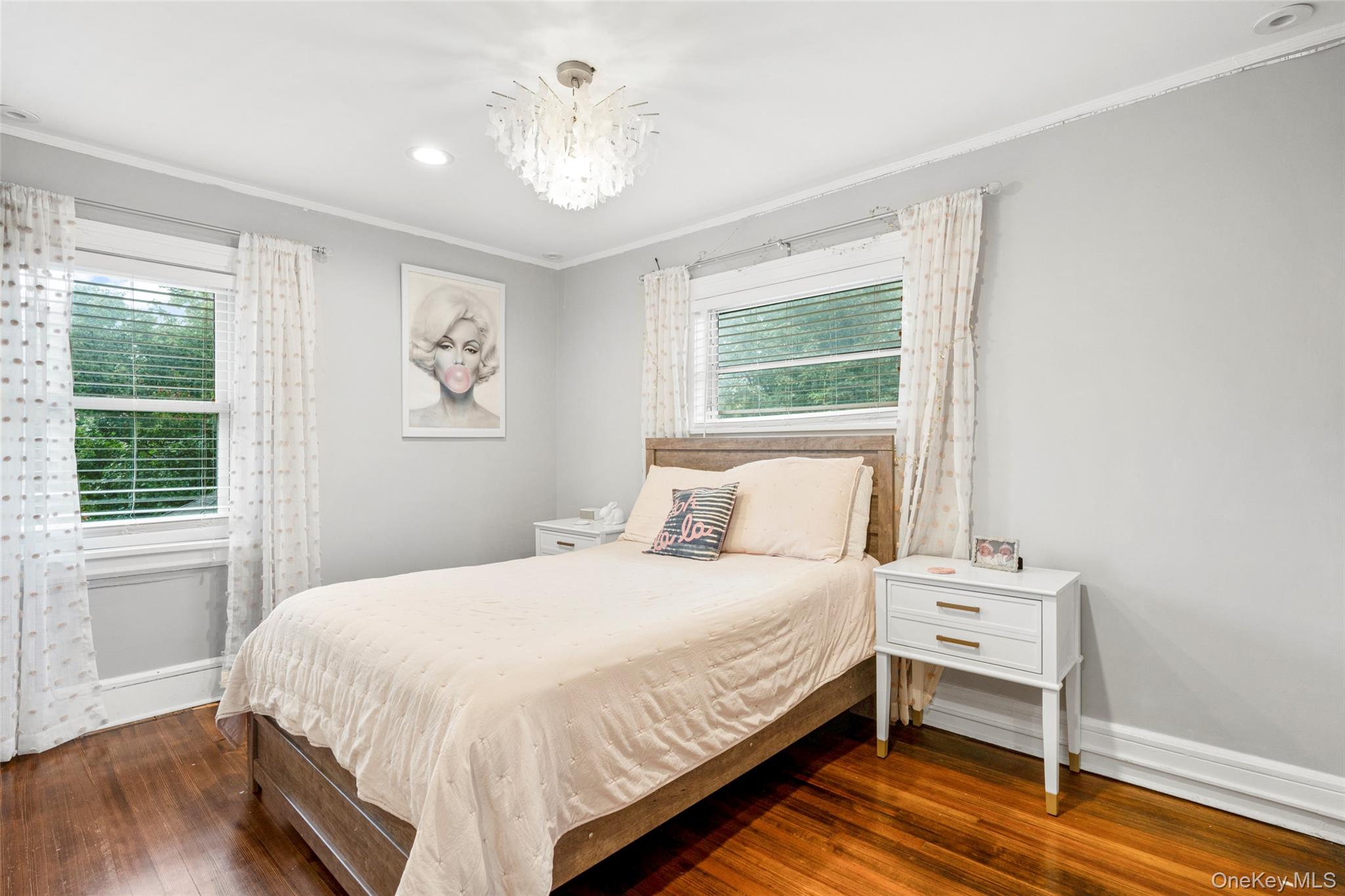 20 Elk Avenue New Rochelle, NY 10804 - Photo 23 of 40 a bedroom with a bed and a window
