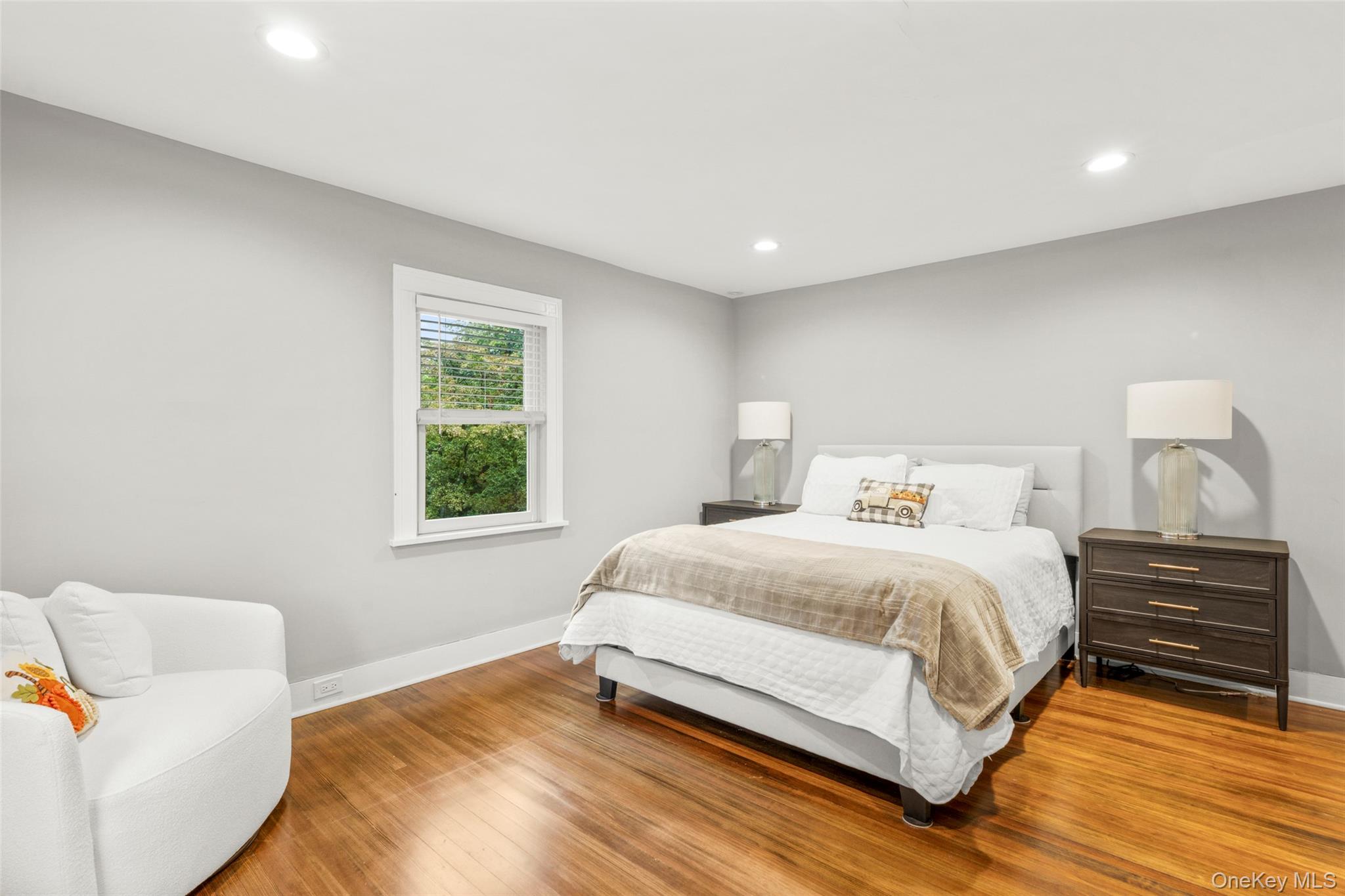 20 Elk Avenue New Rochelle, NY 10804 - Photo 35 of 40 a bedroom with a bed and a window