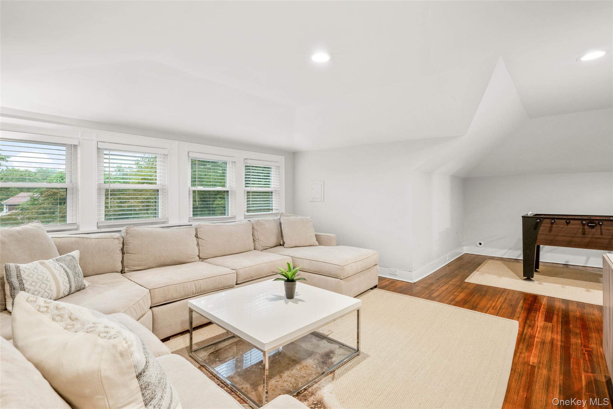 20 Elk Avenue New Rochelle, NY 10804 - Photo 37 of 40 a living room with furniture and a window