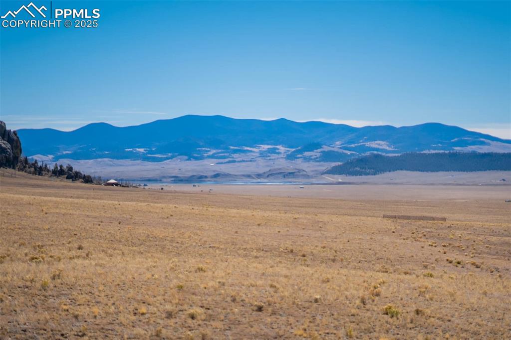 1354 Puma Hills Road Lake George, CO 80827 - Photo 22 of 50 a view of an ocean with a mountain