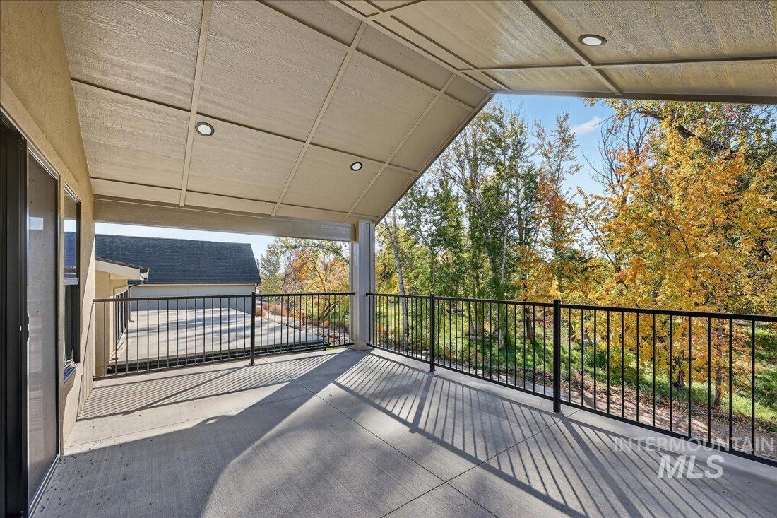 665 Watkins Street Middleton, ID 83644 - Photo 31 of 34 Wooden terrace featuring a patio area and view of wooded area