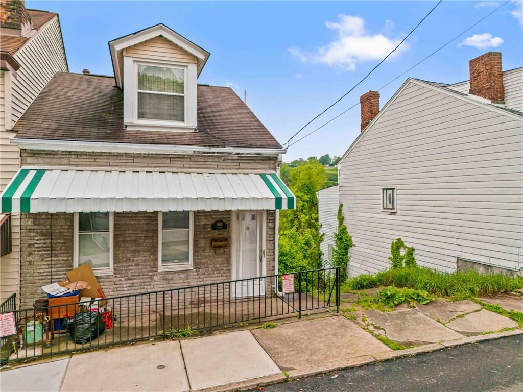 1908 St Paul Street Pittsburgh, PA 15203 - Photo 2 of 28 a front view of a house with garden