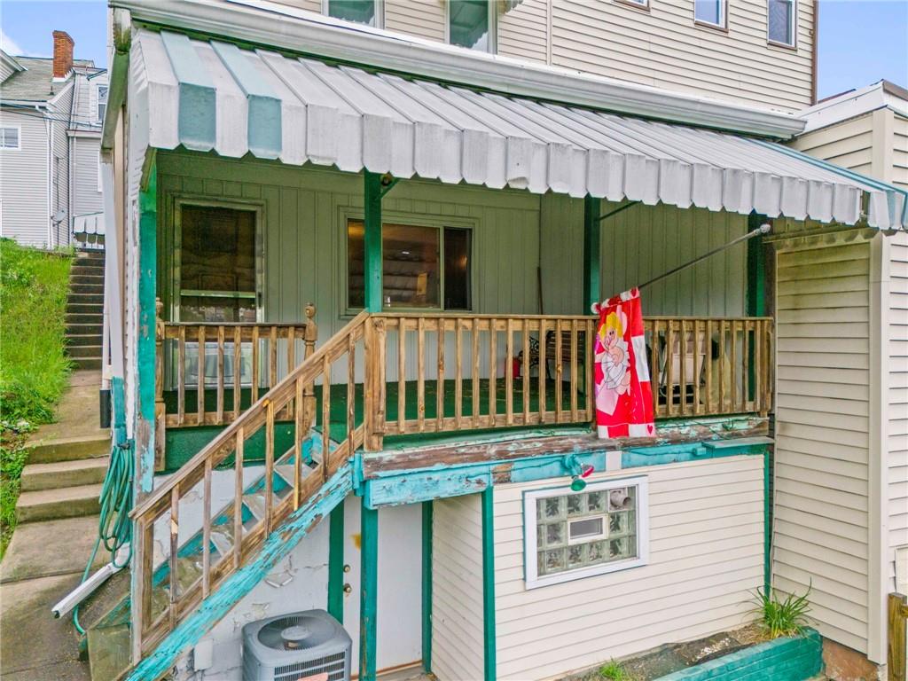 1908 St Paul Street Pittsburgh, PA 15203 - Photo 24 of 28 a view of a house with a small yard and a large window