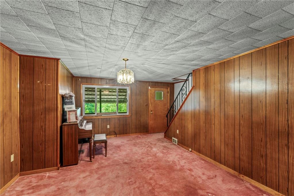 1908 St Paul Street Pittsburgh, PA 15203 - Photo 8 of 28 a view of an empty room with a window