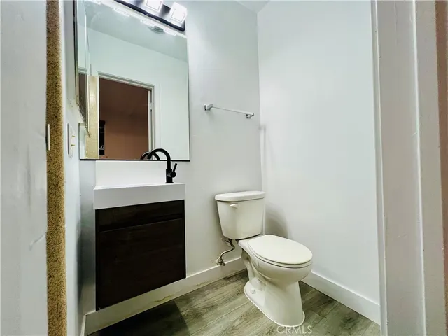 a bathroom with a toilet and a sink
