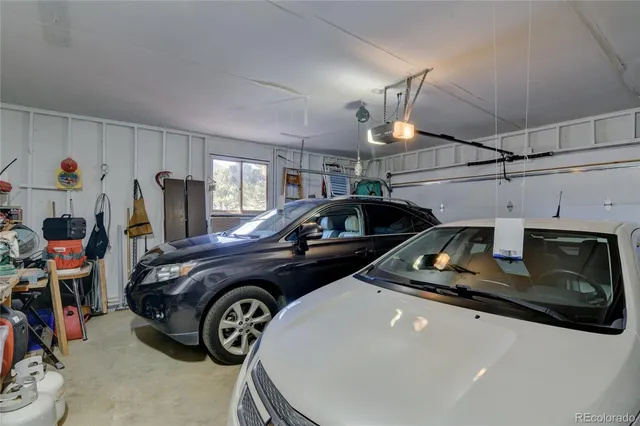 a view of a balcony with furniture