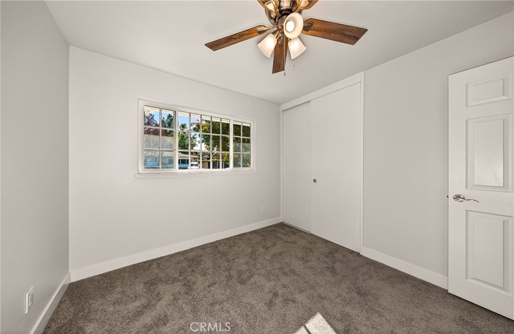 201 Primrose Avenue Redlands, CA 92373 - Photo 20 of 23 an empty room with windows and fan