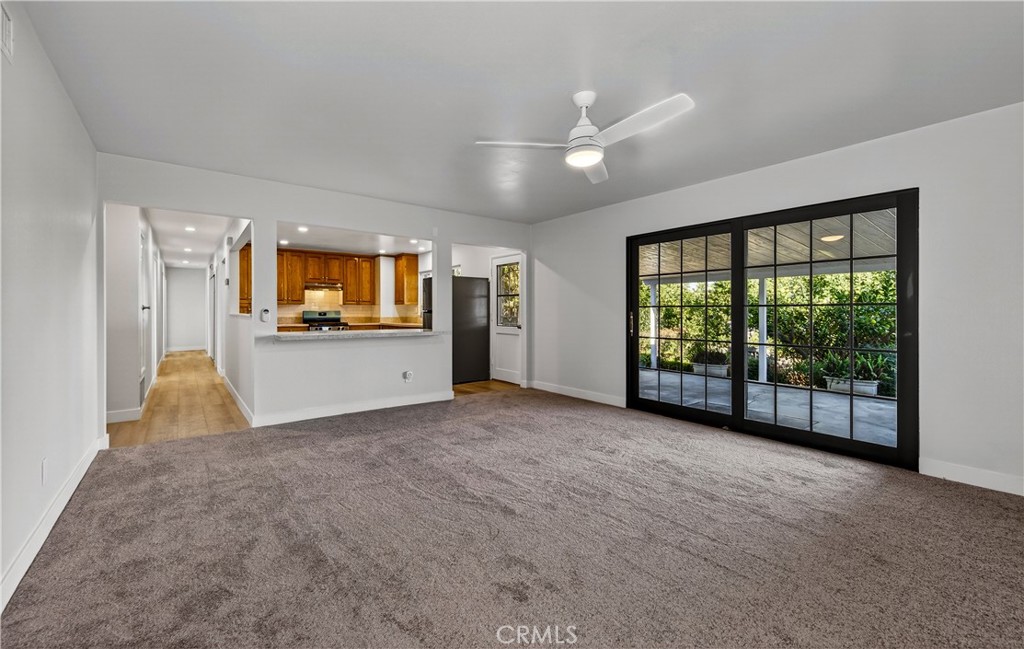 201 Primrose Avenue Redlands, CA 92373 - Photo 8 of 23 a view of a kitchen with a sink and a large window
