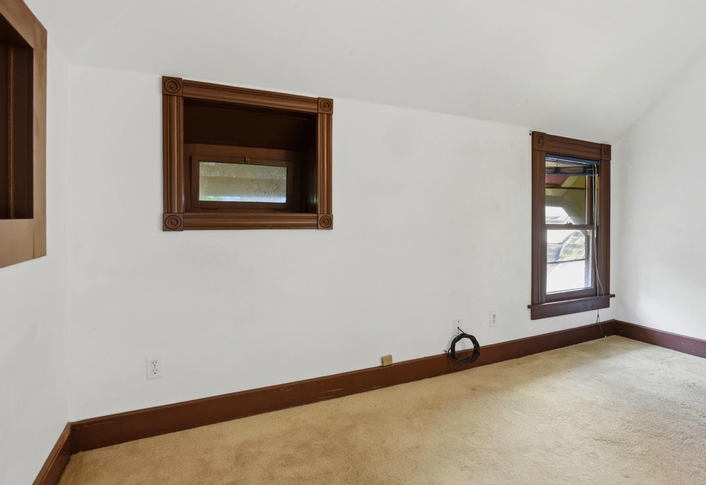 137 Elm Street San Mateo, CA 94401 - Photo 27 of 60 a view of an empty room and window