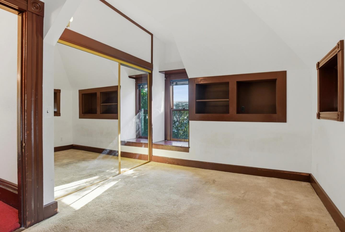 137 Elm Street San Mateo, CA 94401 - Photo 30 of 60 a view of an empty room with a flat screen tv