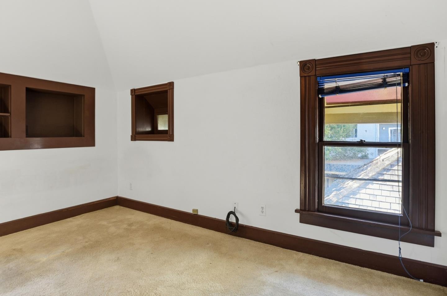 137 Elm Street San Mateo, CA 94401 - Photo 31 of 60 a view of an empty room with a window