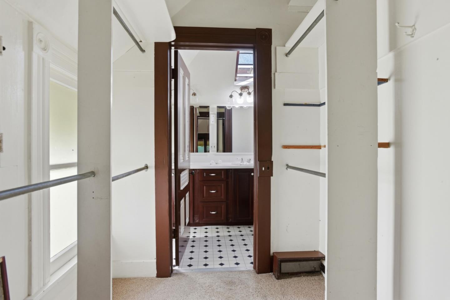 137 Elm Street San Mateo, CA 94401 - Photo 36 of 60 a bathroom with a shower and a mirror