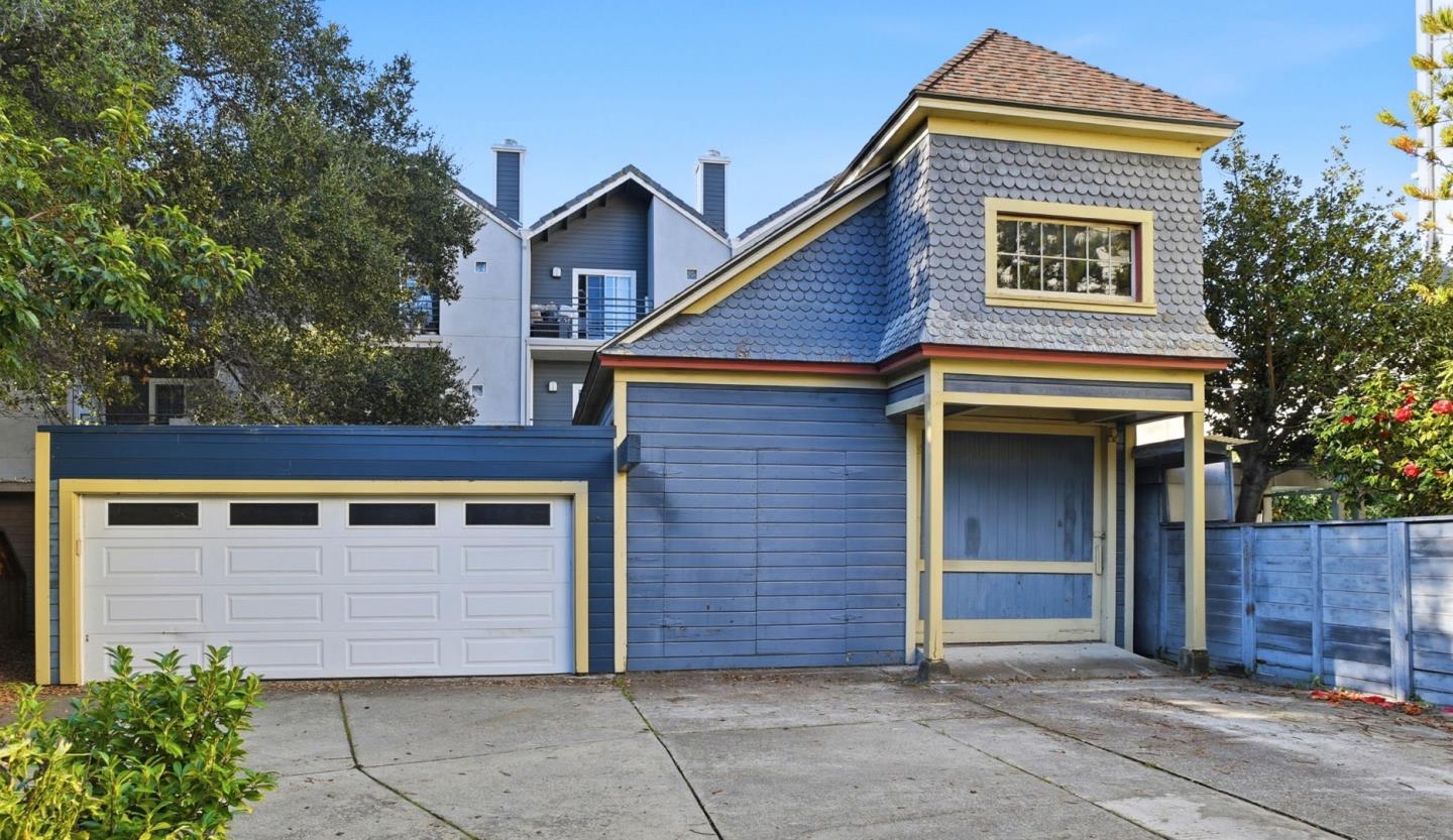 137 Elm Street San Mateo, CA 94401 - Photo 52 of 60 a front view of a house with a garage