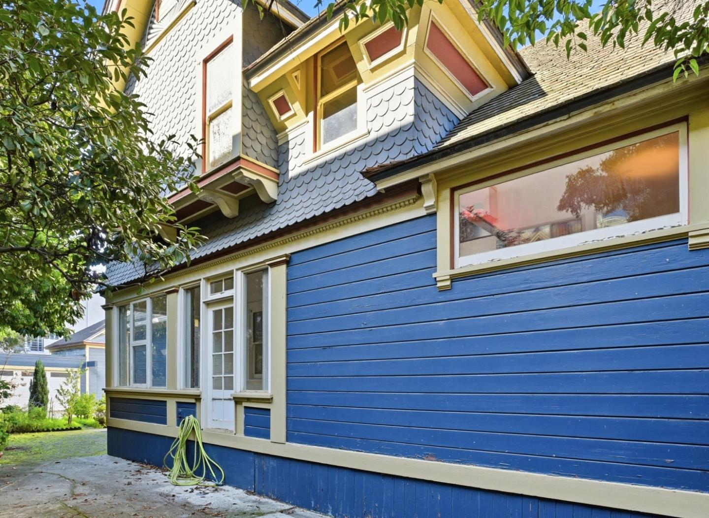 137 Elm Street San Mateo, CA 94401 - Photo 57 of 60 a view of a house with wooden fence