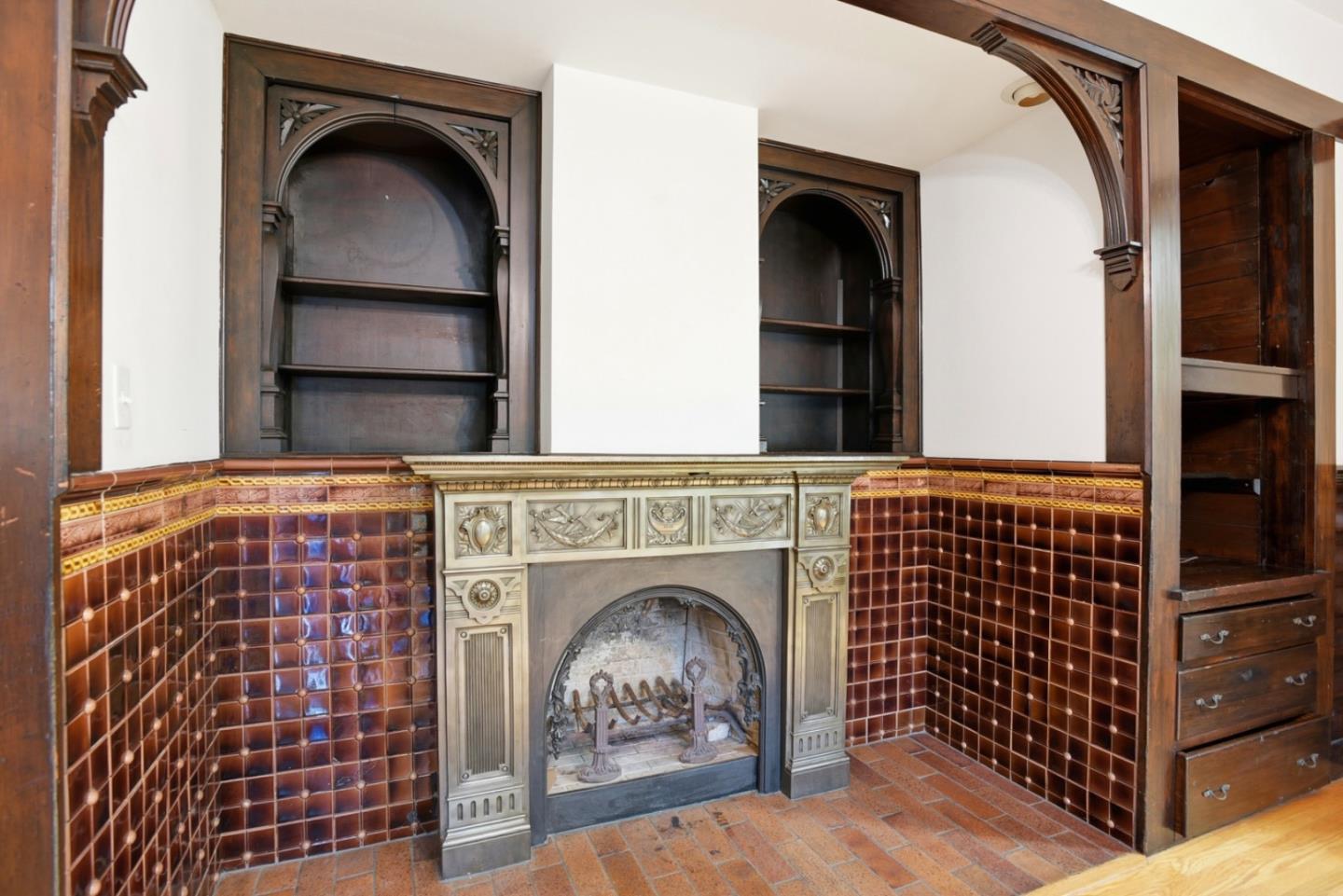 137 Elm Street San Mateo, CA 94401 - Photo 6 of 60 a view of fireplace and window