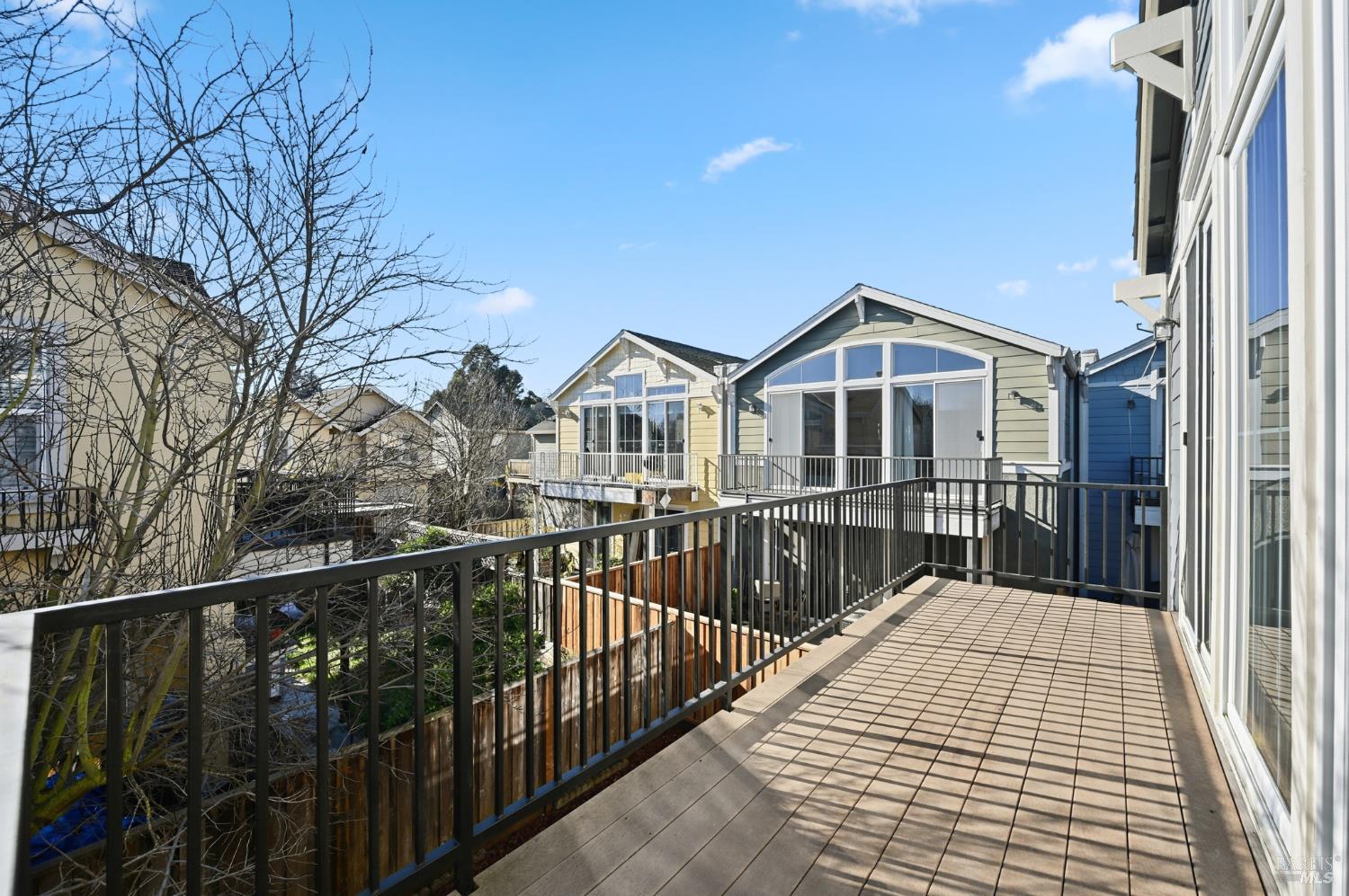 2983 Bay Village Avenue Santa Rosa, CA 95403 - Photo 24 of 35 a view of a house with a small yard and wooden fence