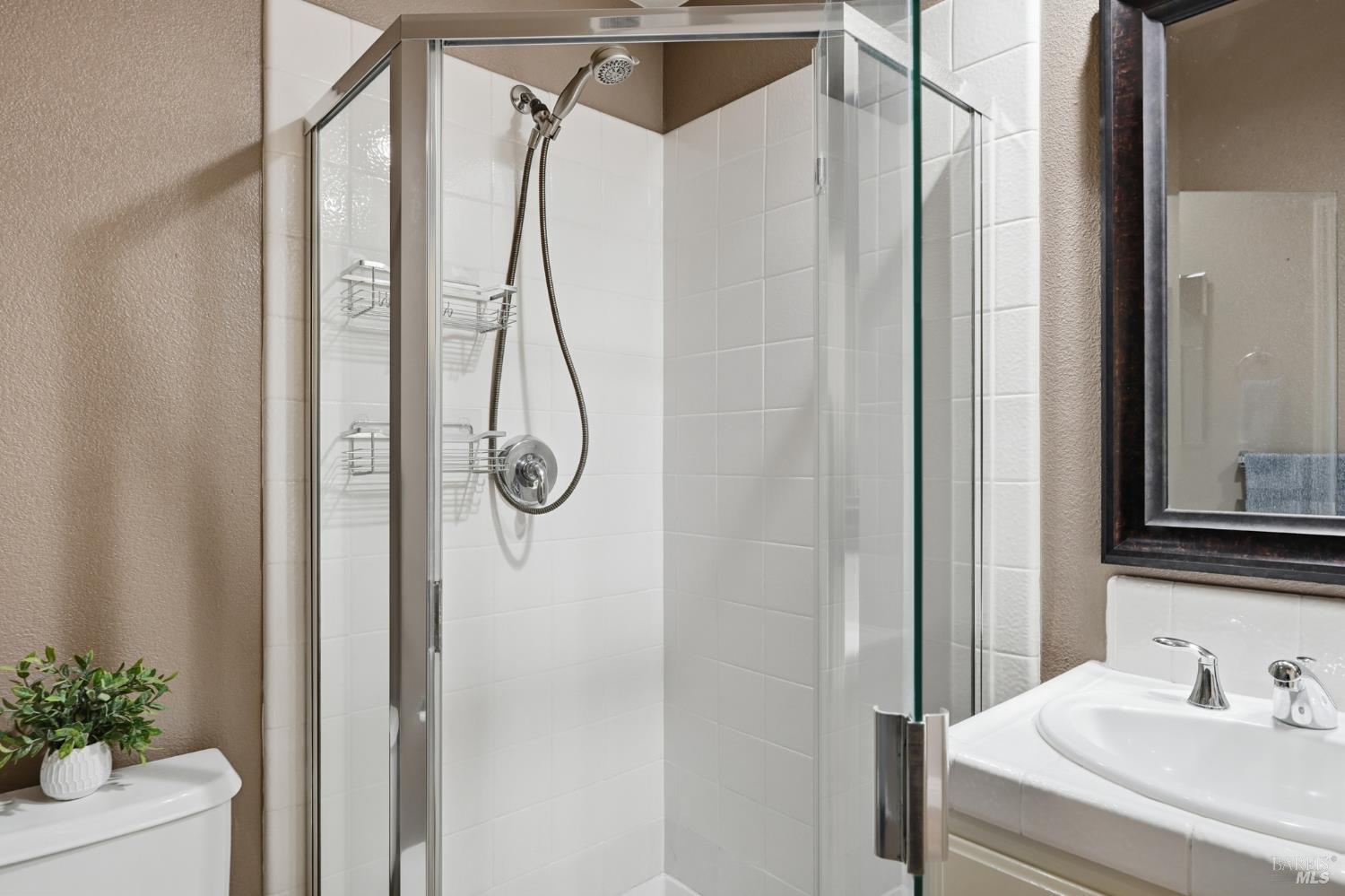 2983 Bay Village Avenue Santa Rosa, CA 95403 - Photo 8 of 35 a bathroom with a shower and a sink