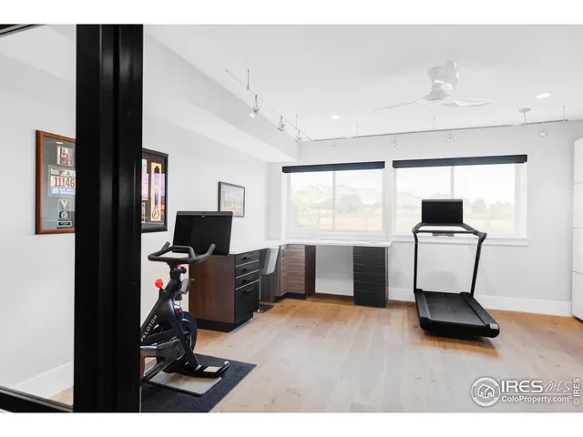 a view of a house with backyard porch and sitting area