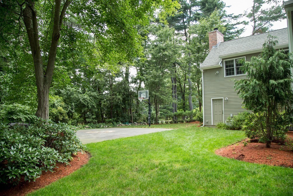 3 Carriage Way Topsfield, MA 01983 - Photo 26 of 30 a view of green field with trees in the background