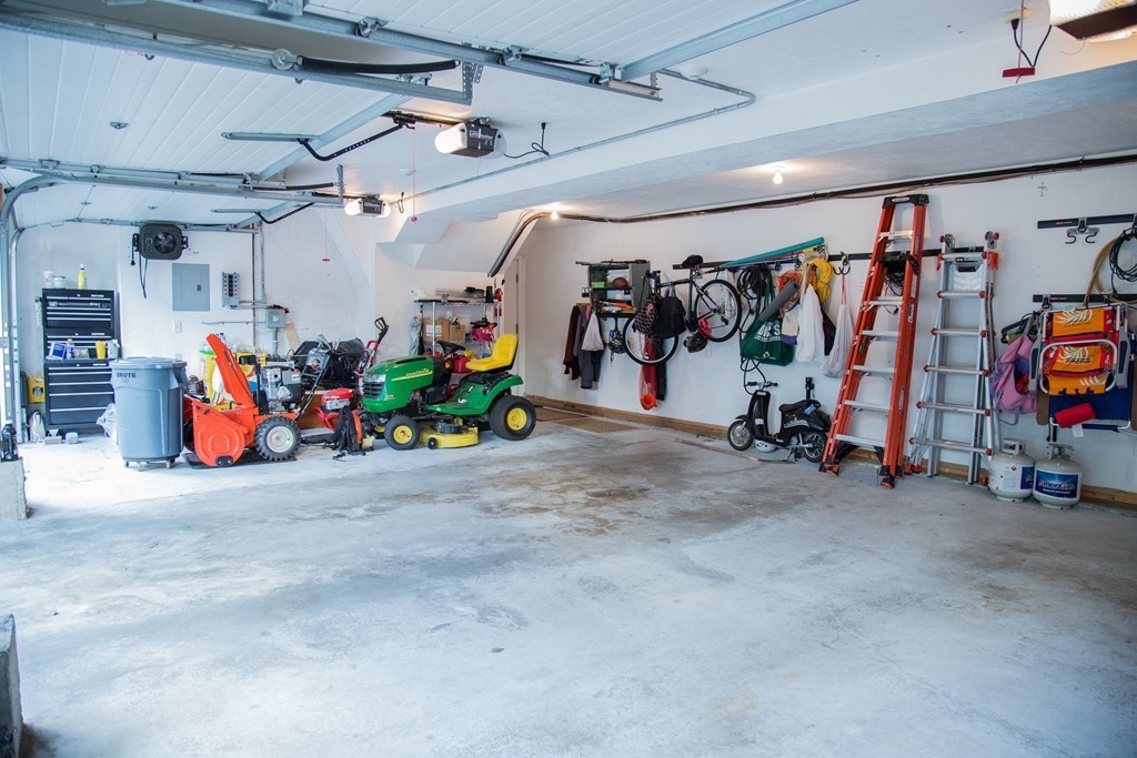 3 Carriage Way Topsfield, MA 01983 - Photo 29 of 30 a view of a garage with rack and bicycle