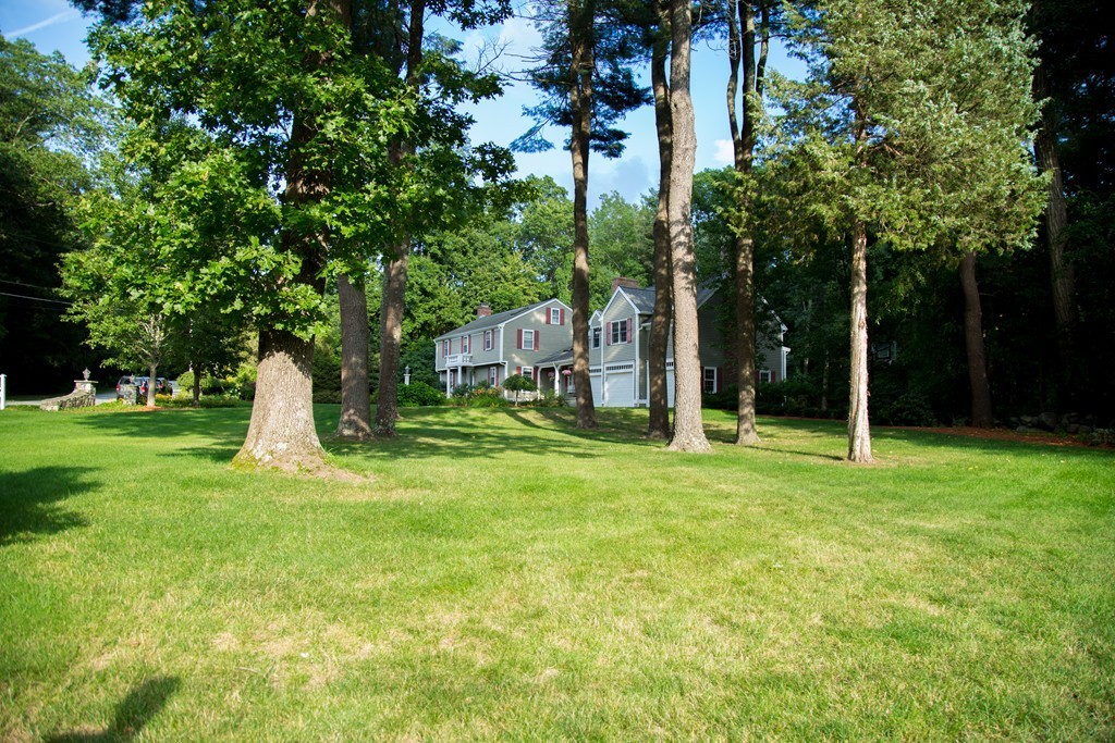 3 Carriage Way Topsfield, MA 01983 - Photo 30 of 30 a view of a playground with a house and large trees
