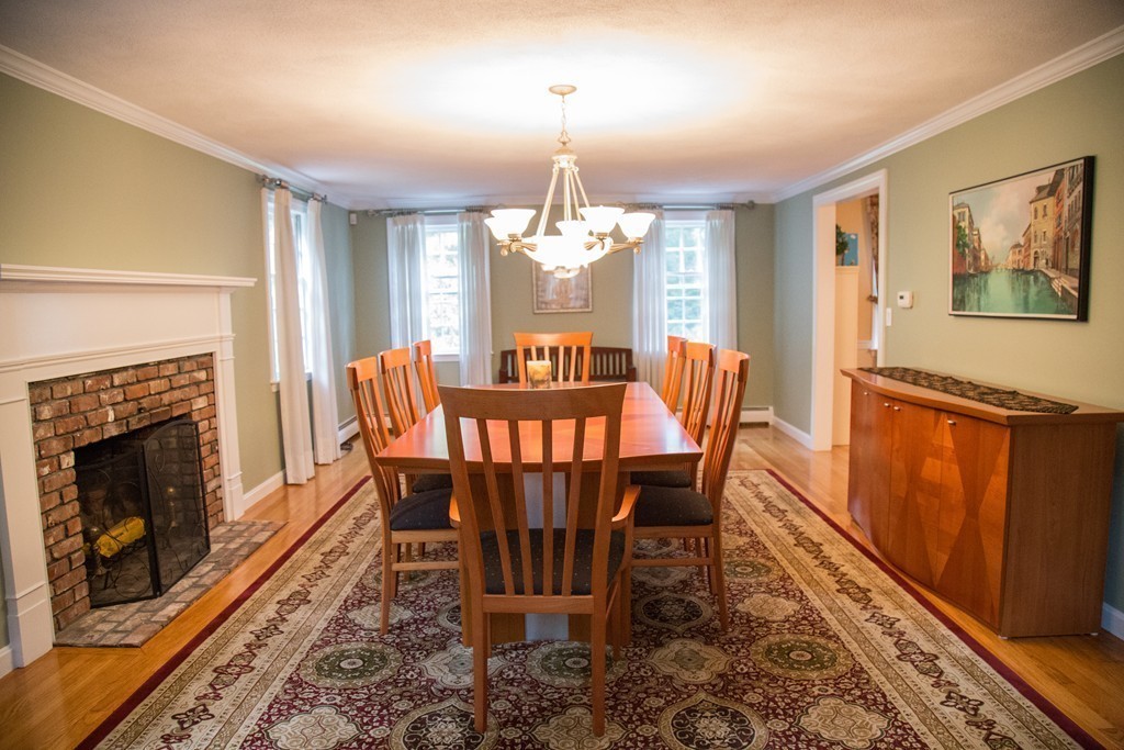 3 Carriage Way Topsfield, MA 01983 - Photo 9 of 30 a view of a dining room with furniture window and wooden floor