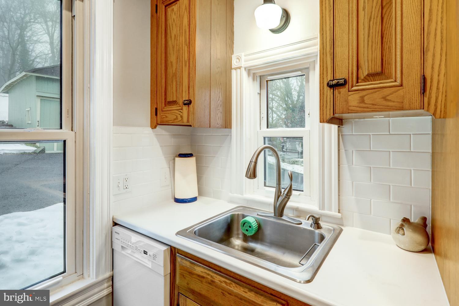2448 Lititz Pike Lancaster, PA 17601 - Photo 14 of 43 a bathroom with a granite countertop sink and a mirror