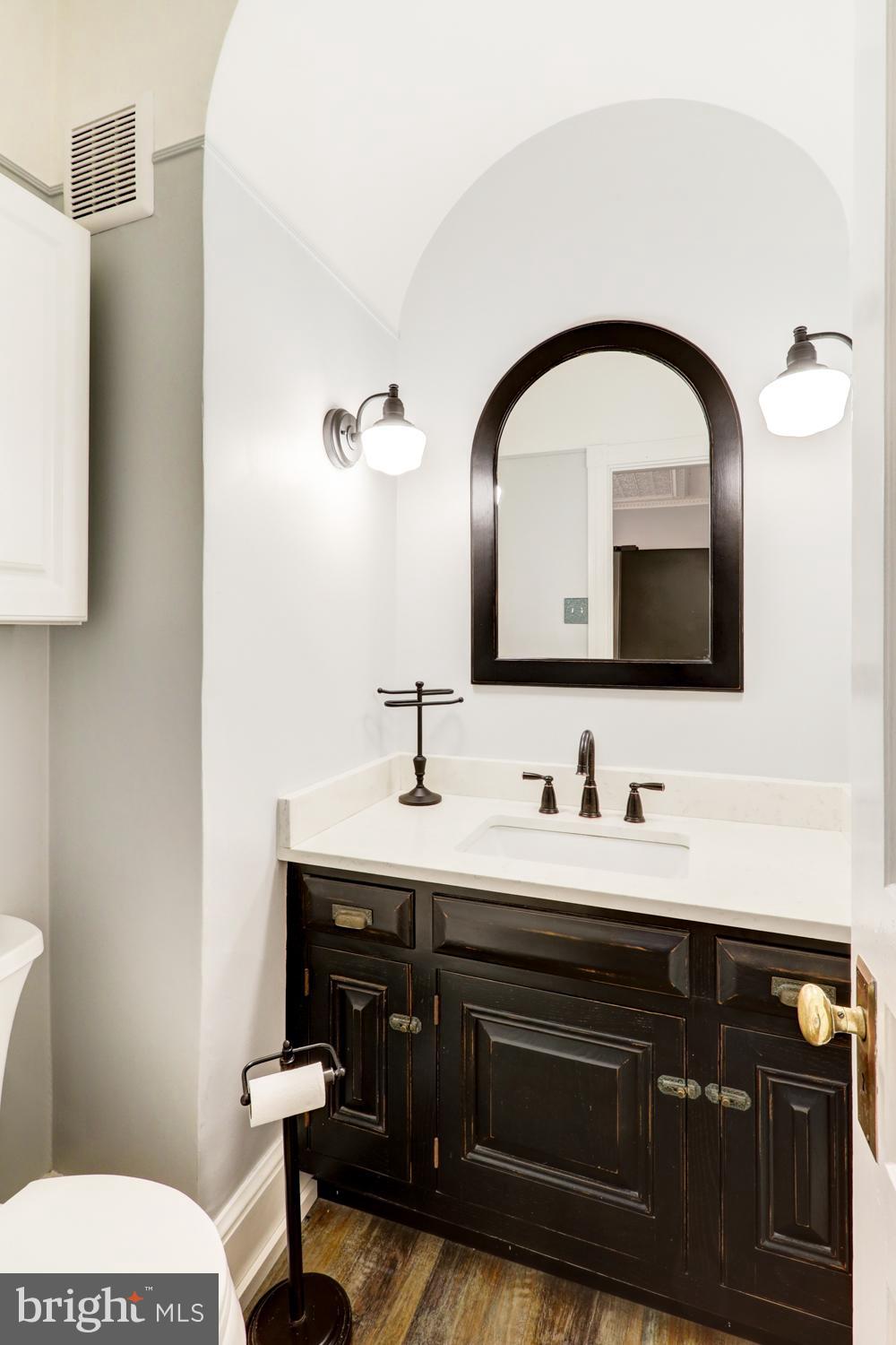 2448 Lititz Pike Lancaster, PA 17601 - Photo 16 of 43 a bathroom with a double vanity sink and a toilet