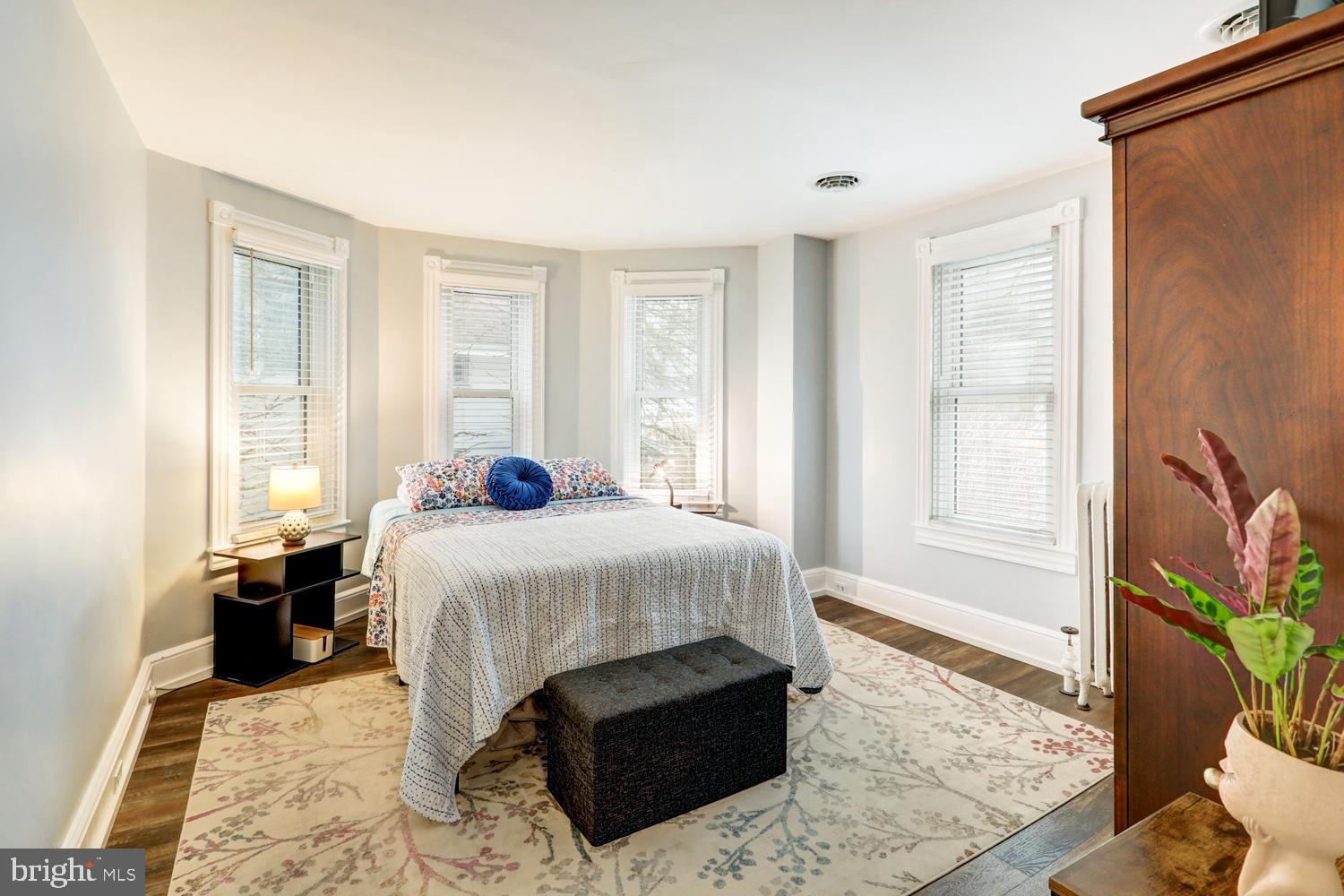 2448 Lititz Pike Lancaster, PA 17601 - Photo 26 of 43 a bedroom with a bed table flowerpot and window