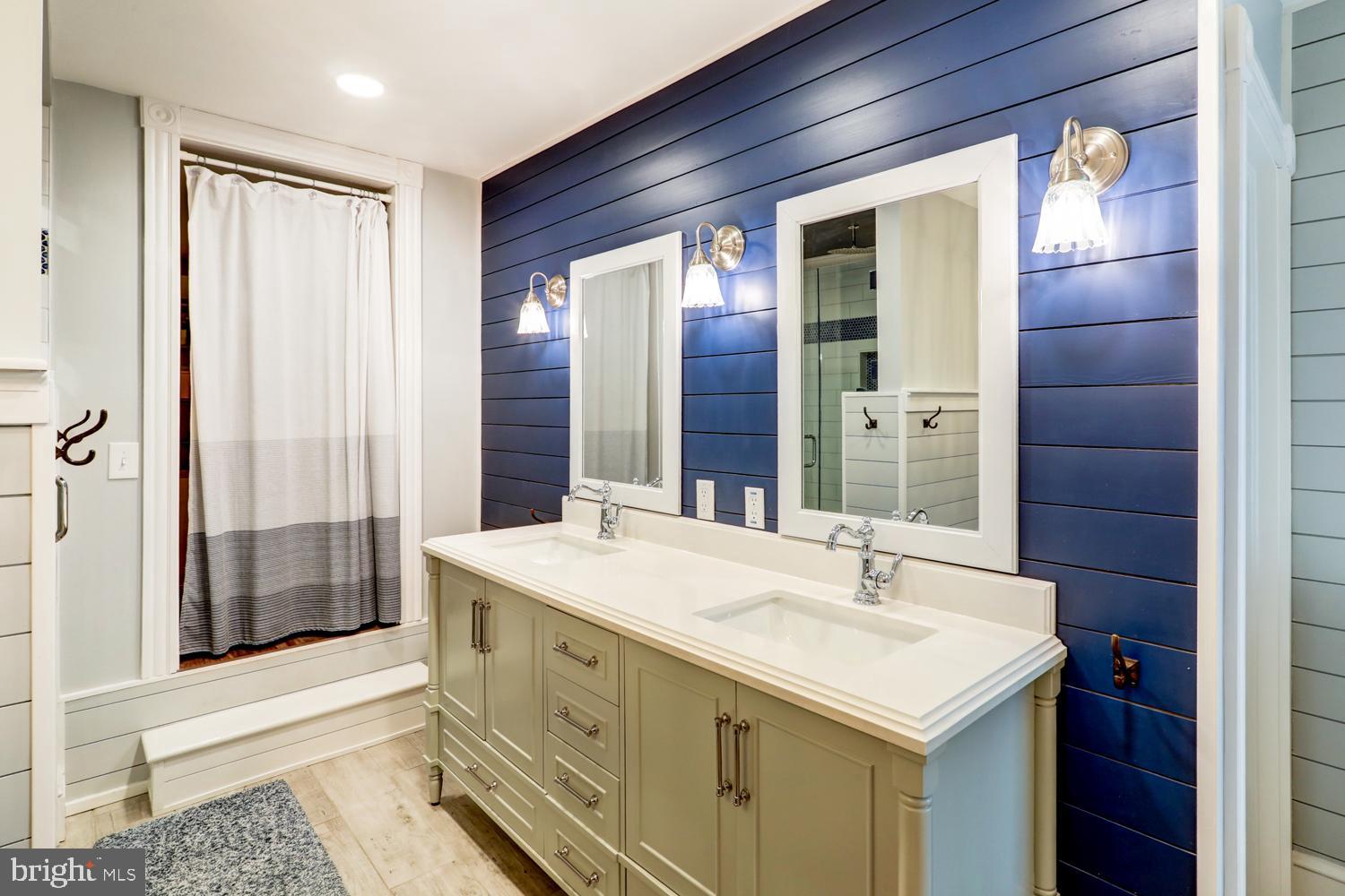 2448 Lititz Pike Lancaster, PA 17601 - Photo 29 of 43 a bathroom with a sink and a mirror