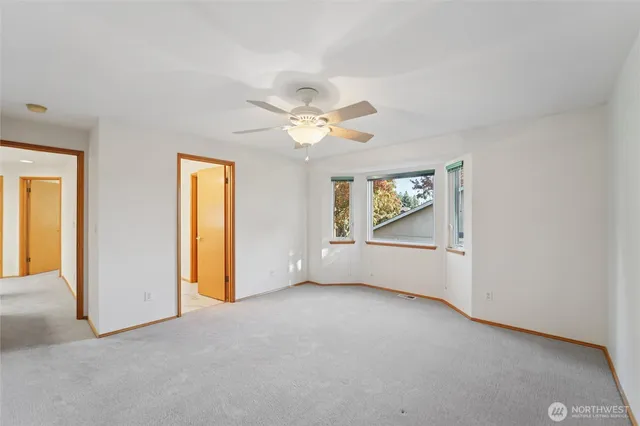 a bathroom with a sink double vanity and a mirror