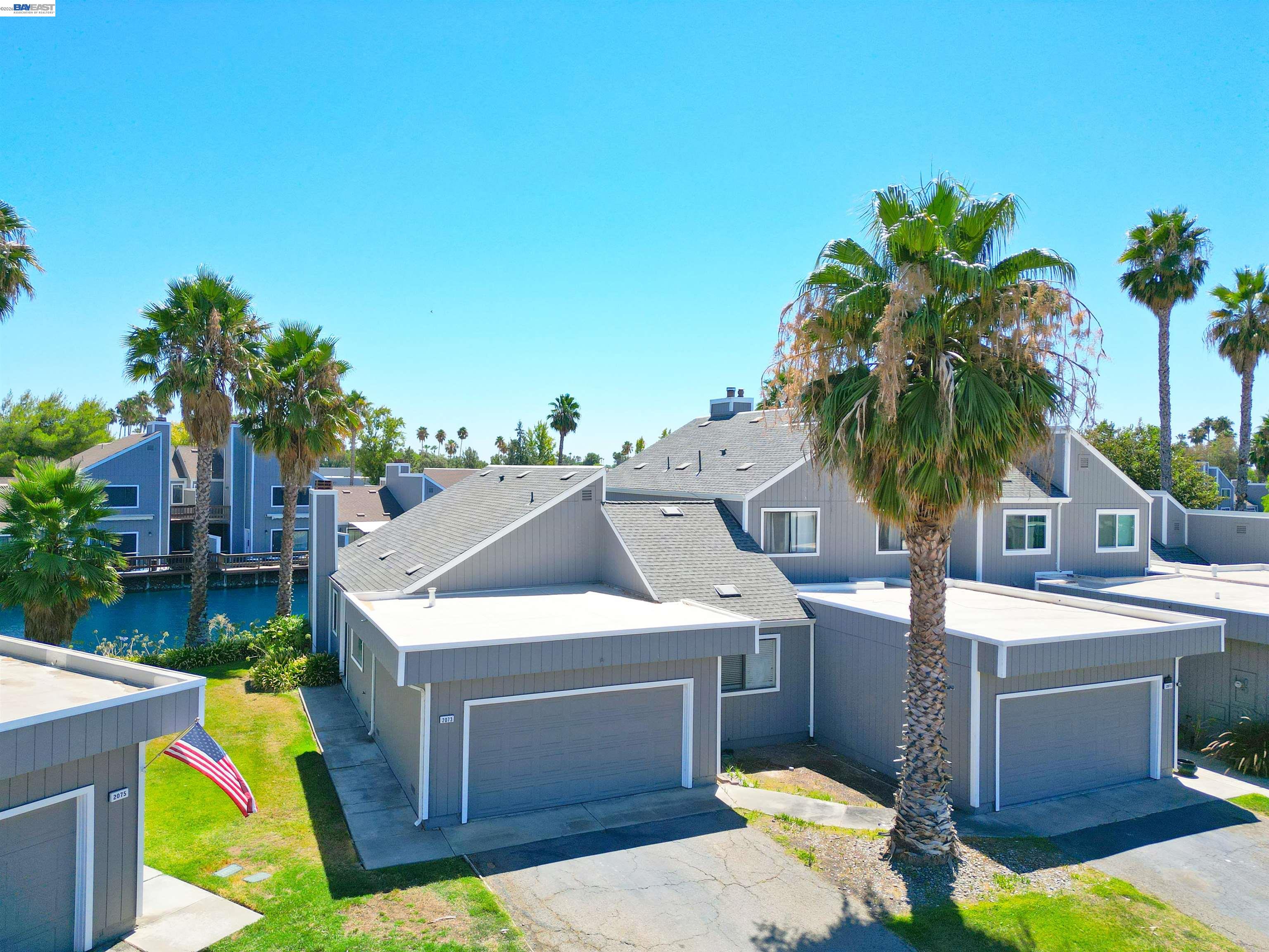 2073 Sand Point Road Discovery Bay, CA 94505 - Photo 3 of 40 a view of a house with swimming pool