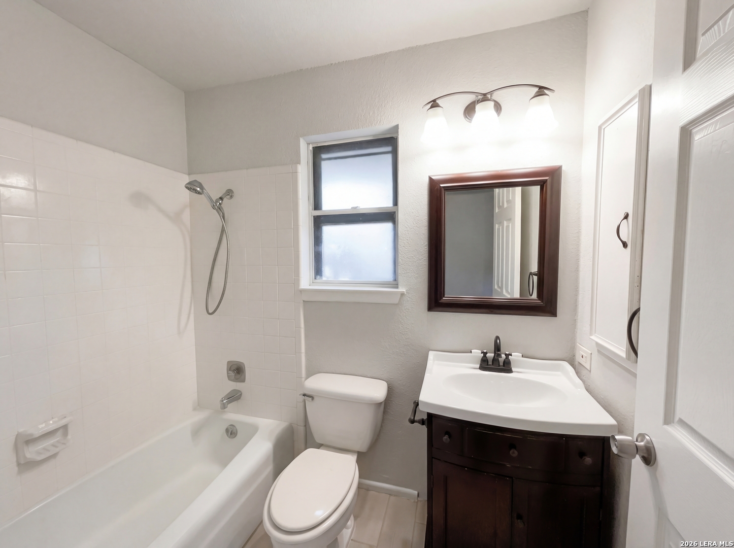 5423 Timberhurst San Antonio, TX 78250 - Photo 14 of 18 a bathroom with a sink toilet and shower