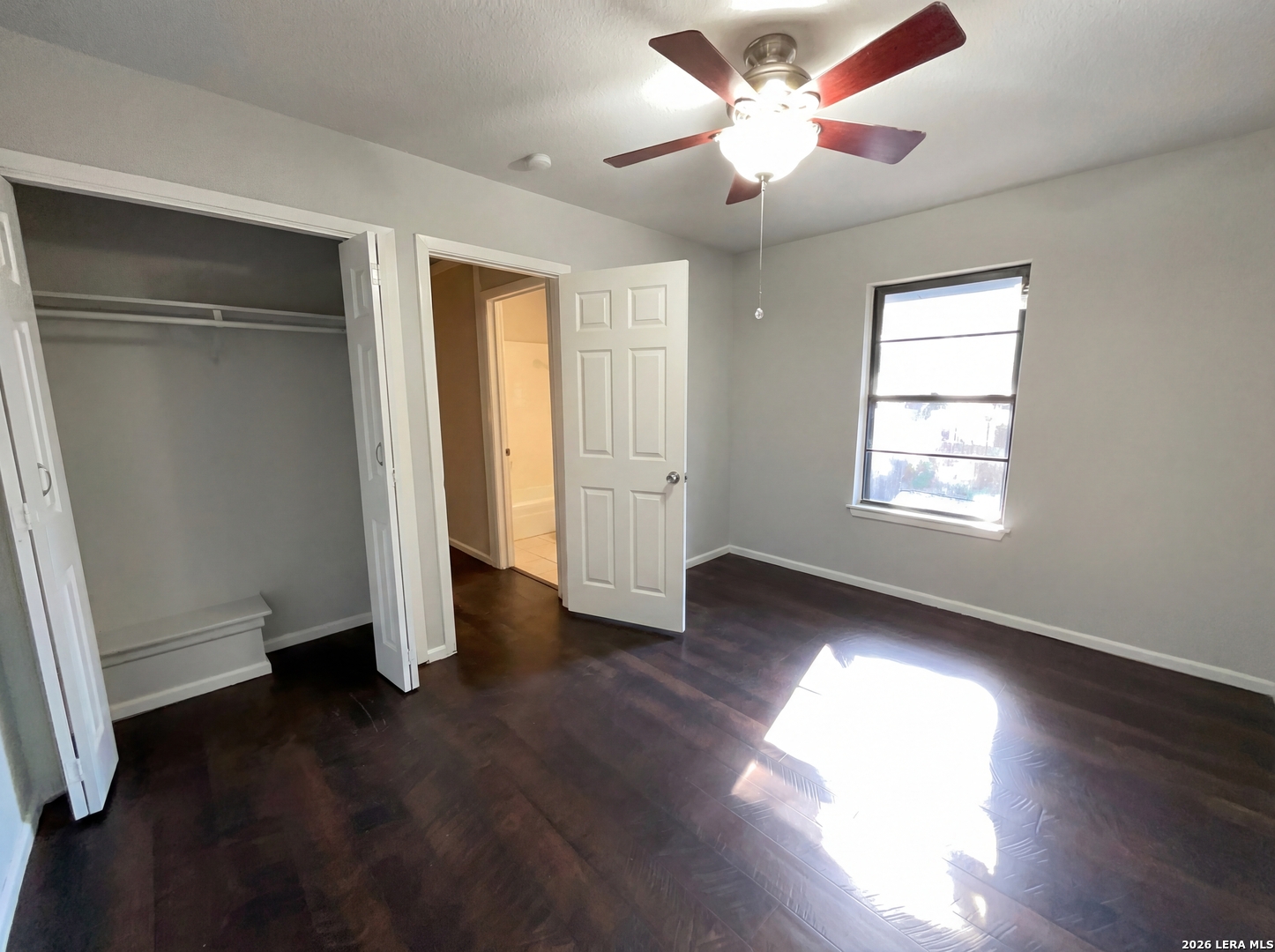 5423 Timberhurst San Antonio, TX 78250 - Photo 15 of 18 a view of empty room with wooden floor and fan