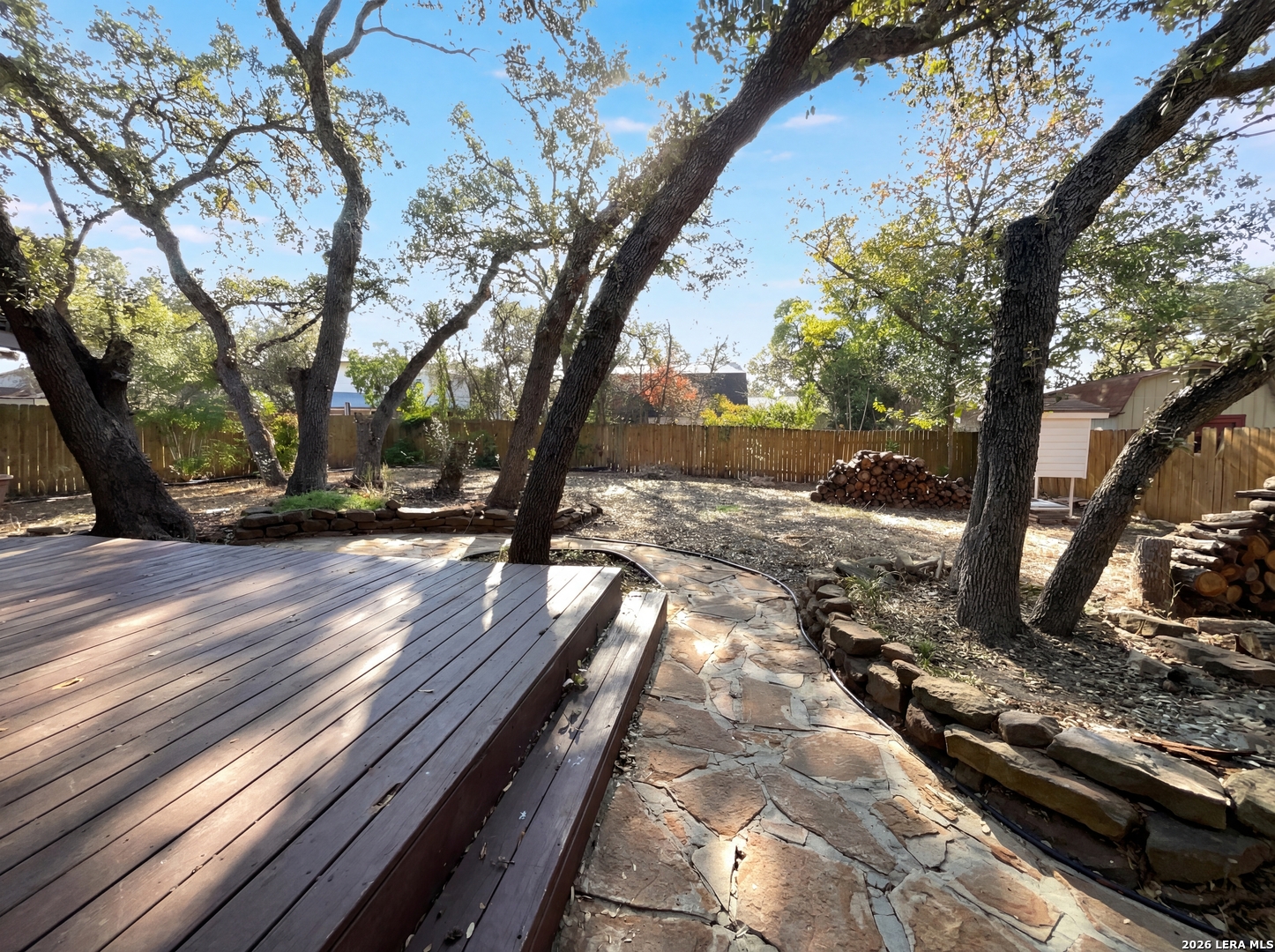5423 Timberhurst San Antonio, TX 78250 - Photo 17 of 18 a view of a yard with street and trees
