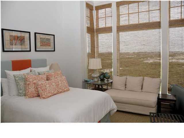 Compass Point, Unit 407 Watersound, FL 32461 - Photo 5 of 7 a living room with furniture and large windows