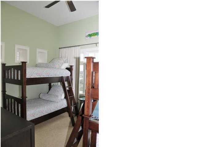 Compass Point, Unit 407 Watersound, FL 32461 - Photo 6 of 7 a view of a hallway with workspace