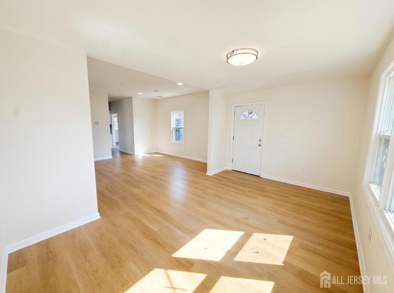 103 Logan Lane Bridgeport, NJ 08014 - Photo 4 of 11 a view of an empty room