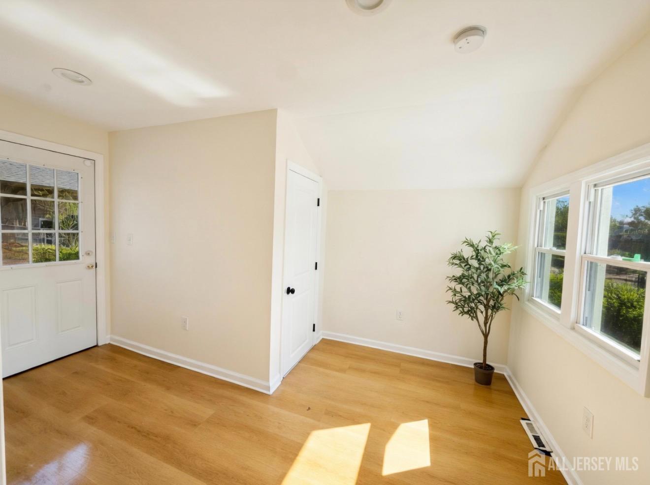 103 Logan Lane Bridgeport, NJ 08014 - Photo 7 of 11 a view of a room with window and tree