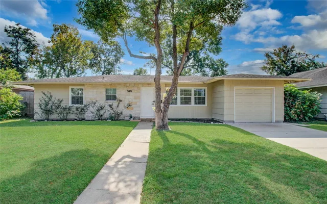 front view of house with a yard