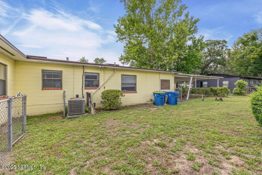 2305 Broward Road Jacksonville, FL 32218 - Photo 27 of 30 a view of a house with backyard and a garden
