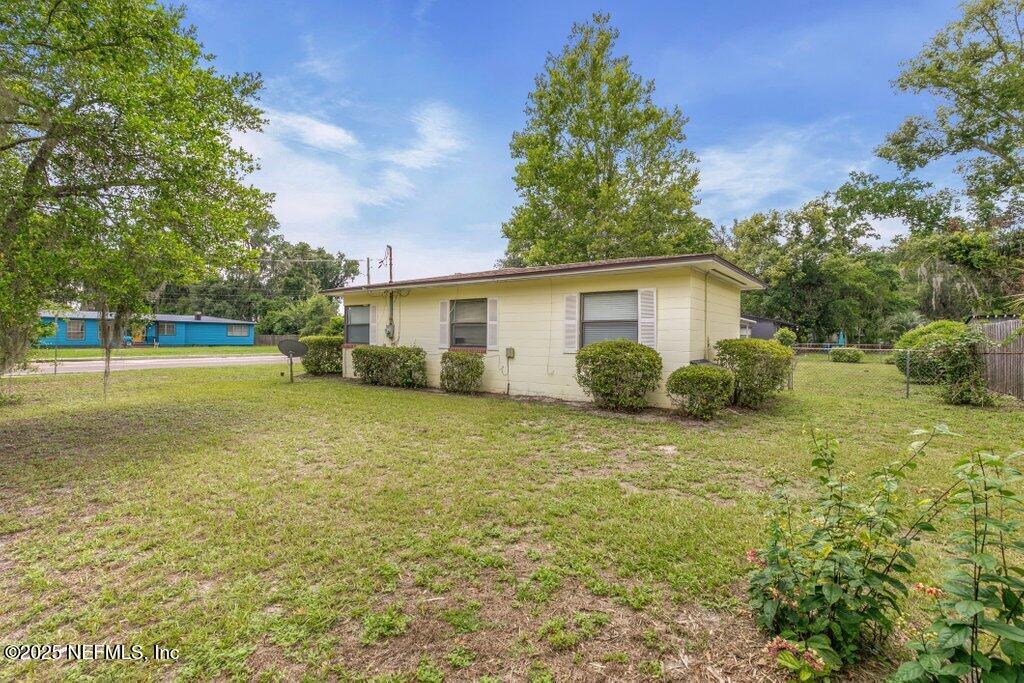 2305 Broward Road Jacksonville, FL 32218 - Photo 28 of 30 a view of an house with backyard space and garden